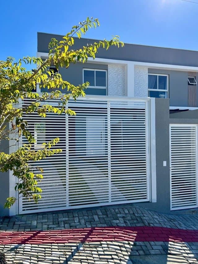 Foto 1 de Sobrado 1 suíte + 2 dorms à venda · Espinheiros, Itajaí · 109 m² · SO0069