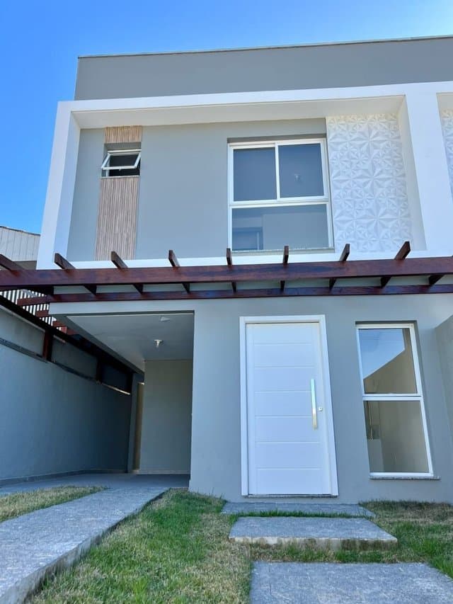 Foto 1 de Sobrado 1 suíte + 2 dorms à venda · Espinheiros, Itajaí · 109 m² · SO0068